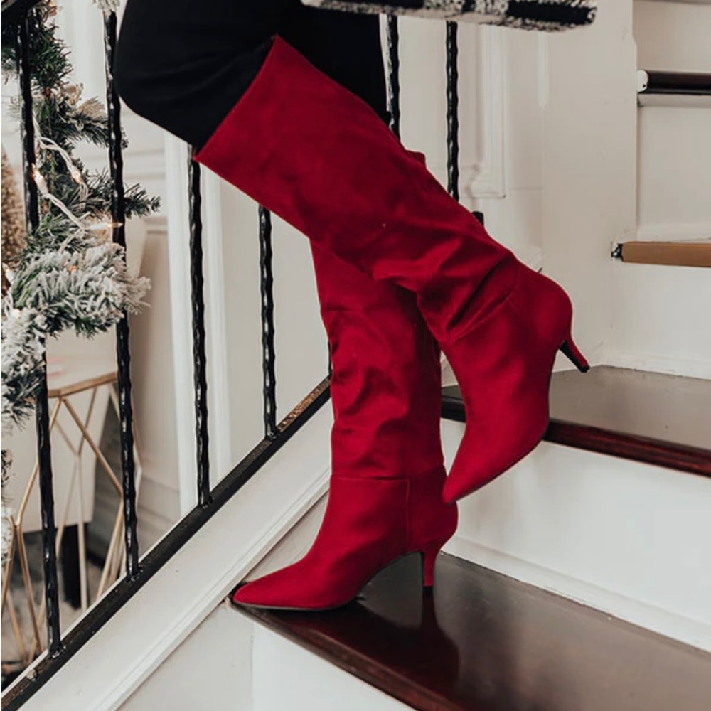 Brand new beautiful red kitten heel boot. In box never worn.